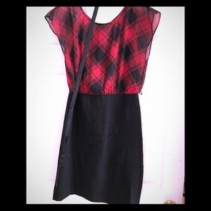 Woman’s above-knee cocktail dress